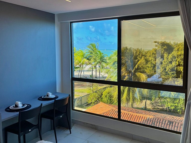 Apto Vista Mar – Piscina com Cenário de Paraíso