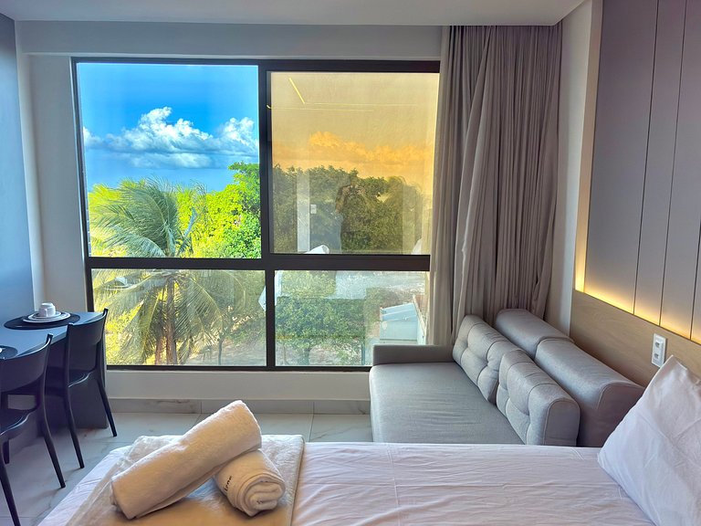 Apto Vista Mar – Piscina com Cenário de Paraíso